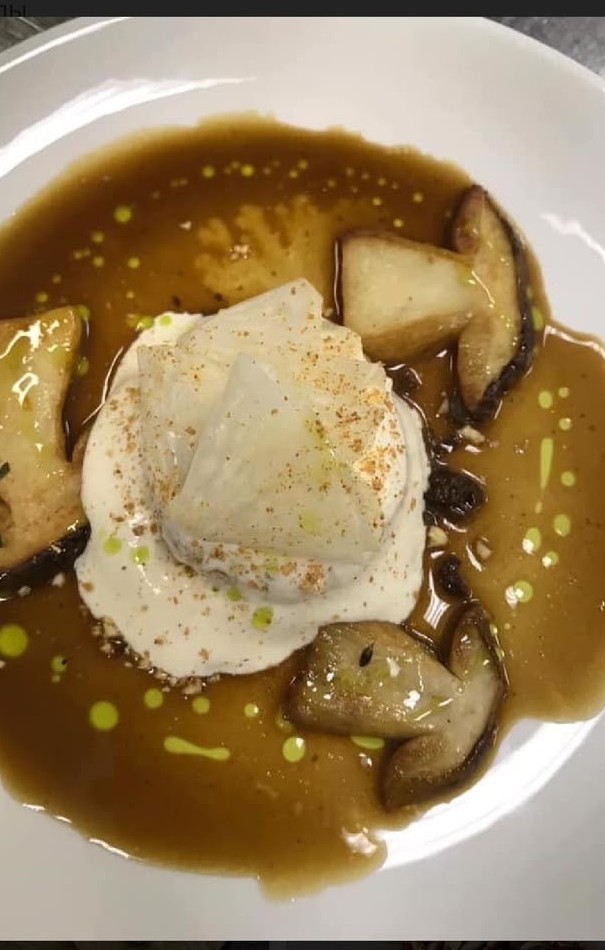 Porcini mushroom soup with poached egg and herb oil