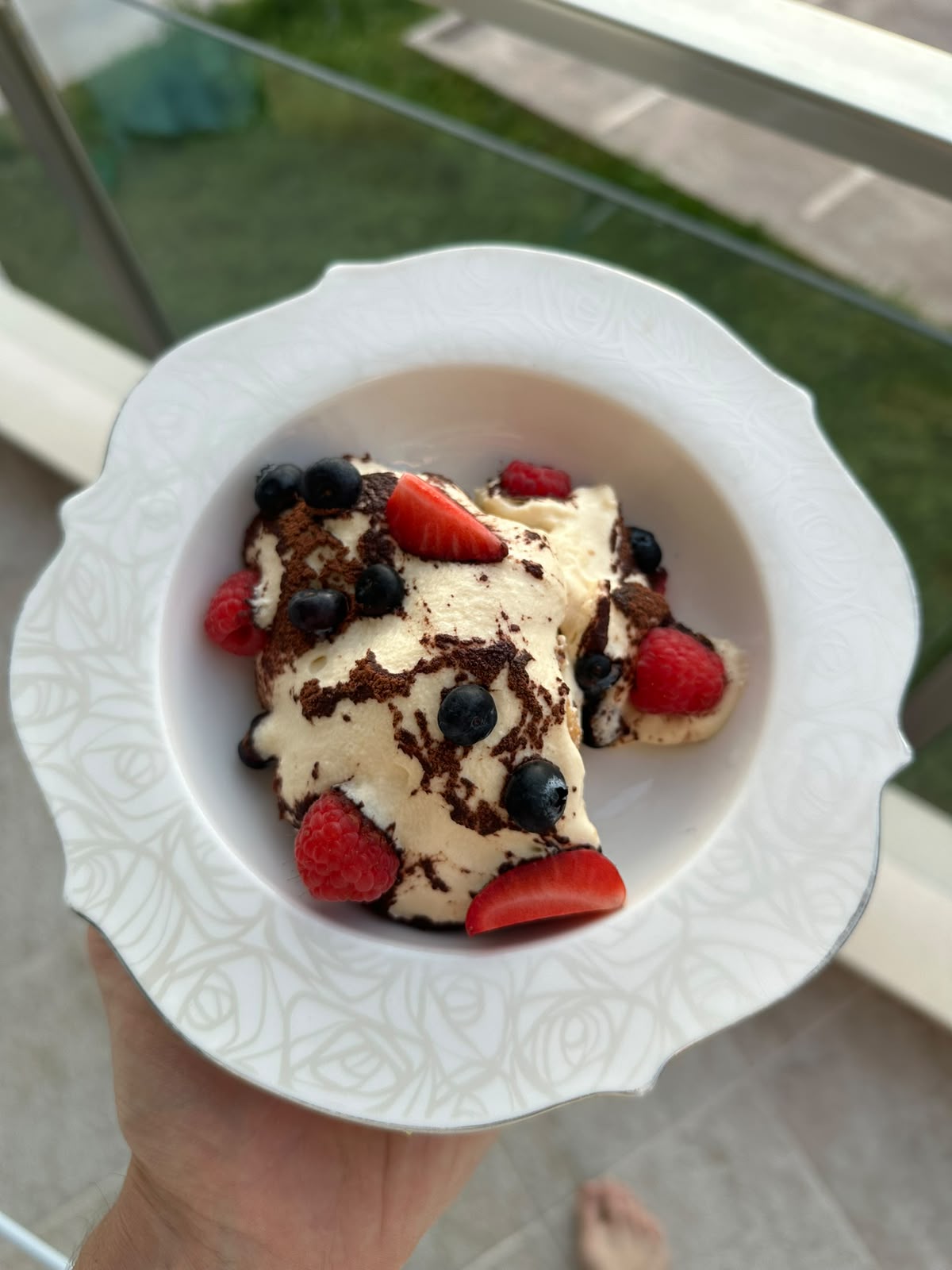 Tiramisu with raspberries, blueberries and strawberries