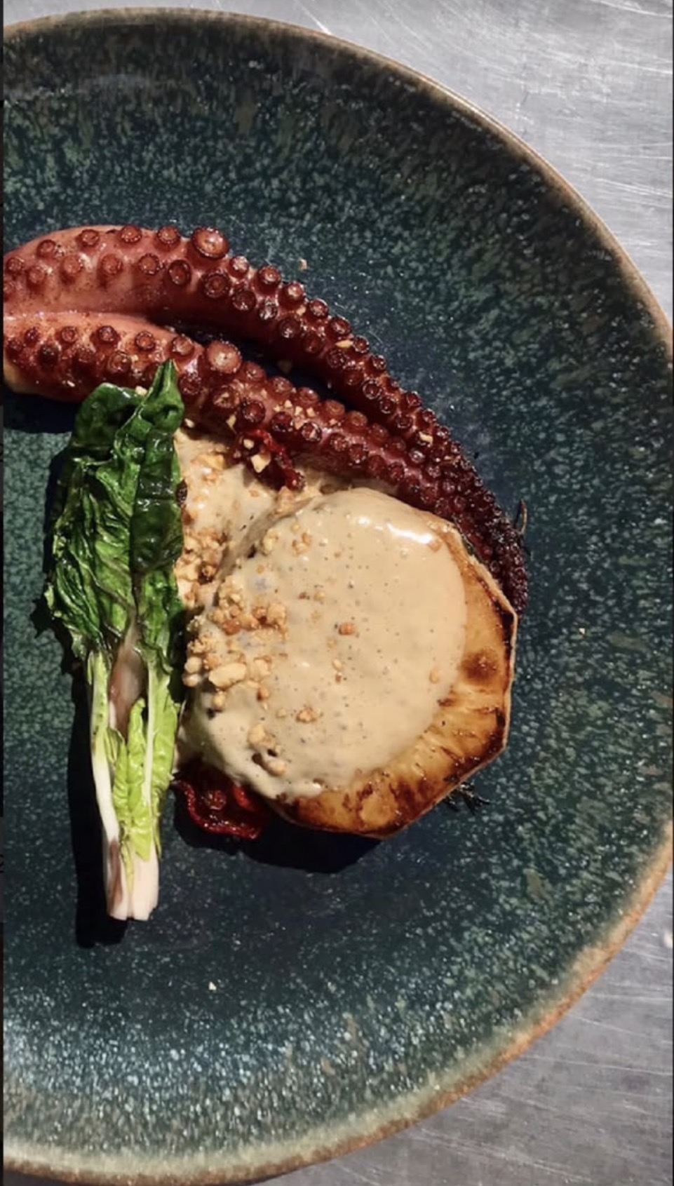 Grilled octopus with scallop and pak choi