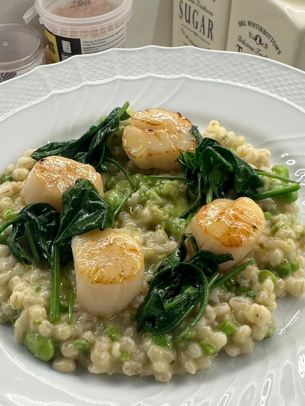 Aged wagyu with charred vegetables plated in fine dining style