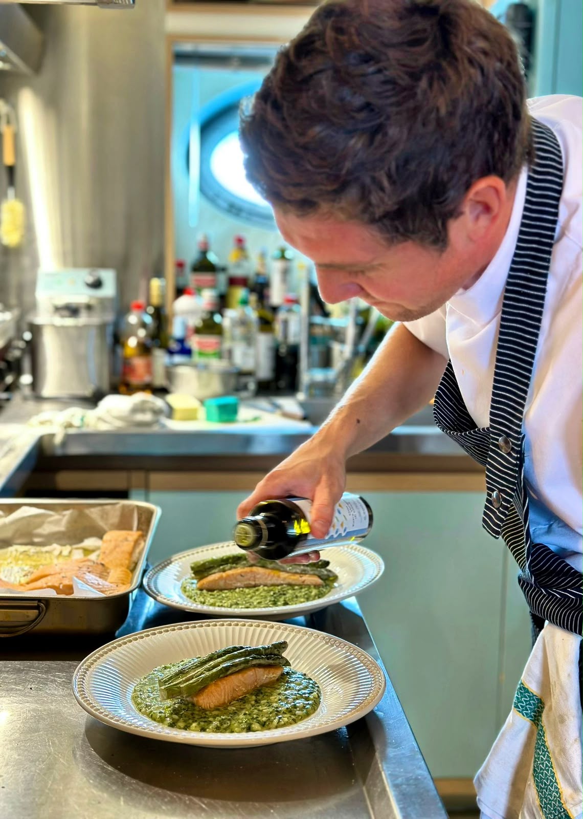 Evgeny Kaverin plating a dish in service
